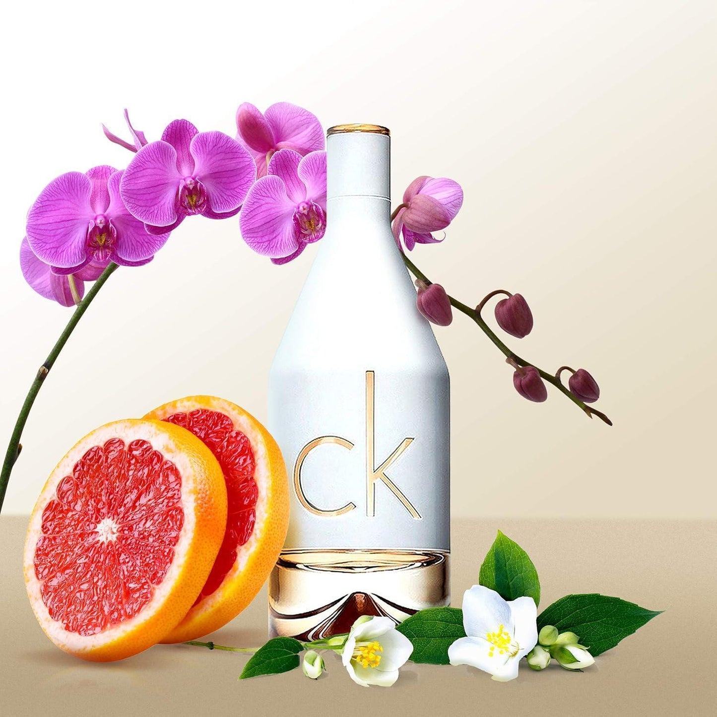 Calvin Klein CK One Gold Eau de Toilette 100ml fragrance bottle with orchids and grapefruit slices