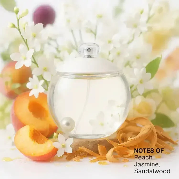 Perfume bottle with peach, jasmine, sandalwood notes, white flowers, and fruit slices