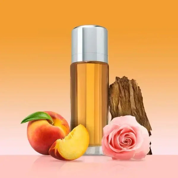 Fragrance bottle with peach, rose, and wood accents on gradient background