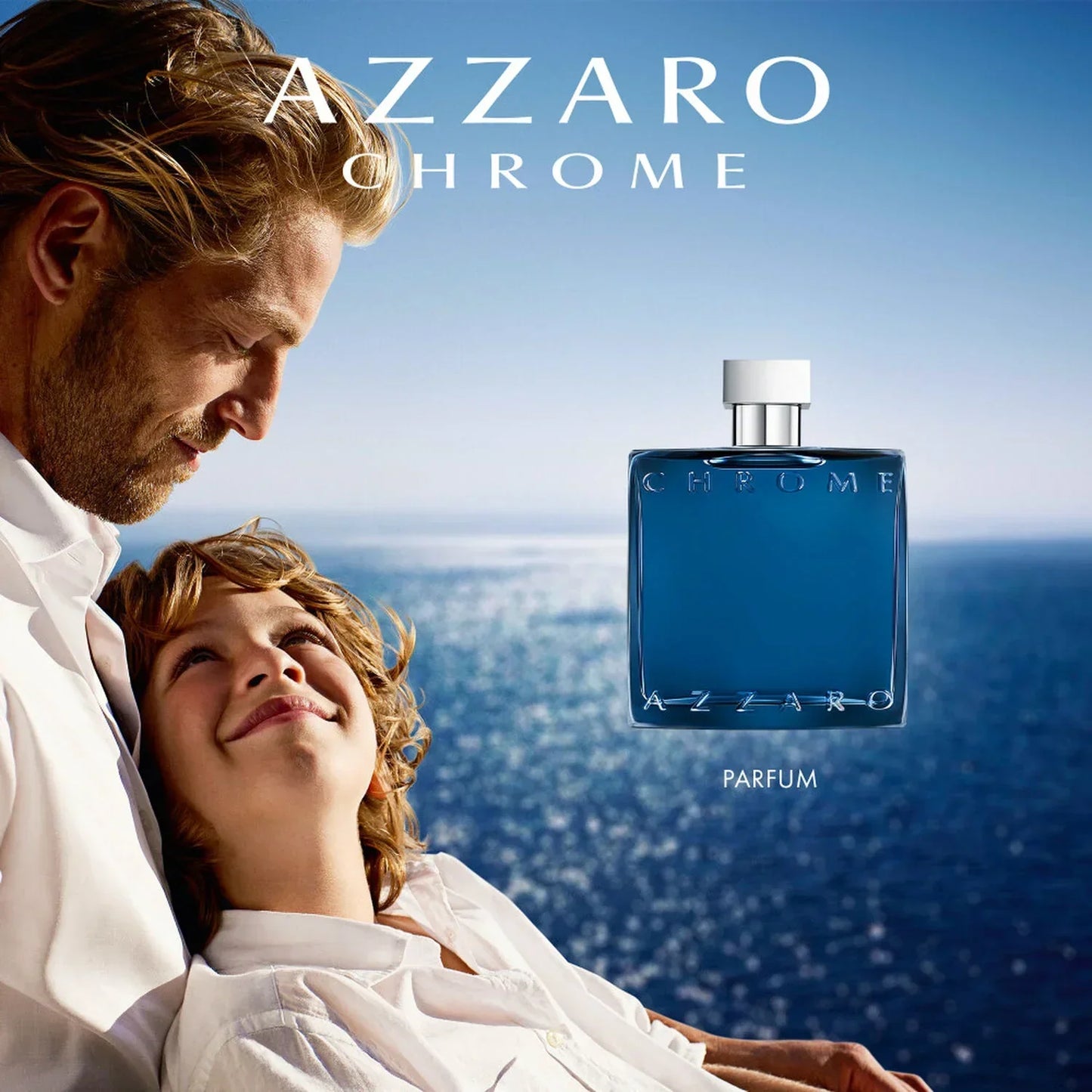Azzaro Chrome Parfum fragrance bottle with ocean backdrop and父子 bonding scene