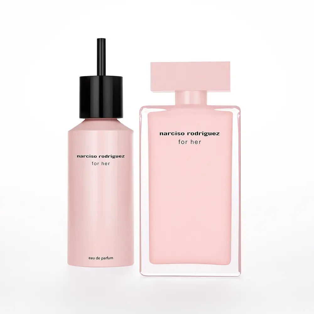 Two pink perfume bottles by Narciso Rodriguez on a white background