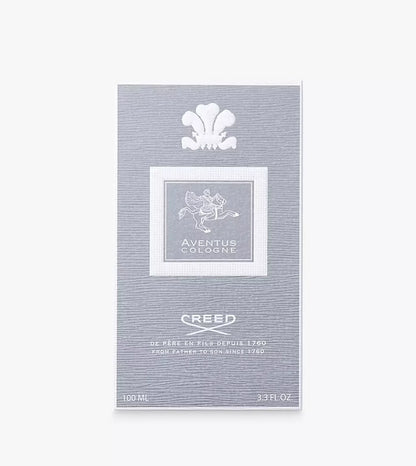 Creed Aventus Cologne 100ml (3.3 fl oz) retail packaging card, featuring a textured silver-gray background with white printed details, the Aventus logo, and the Creed brand name.