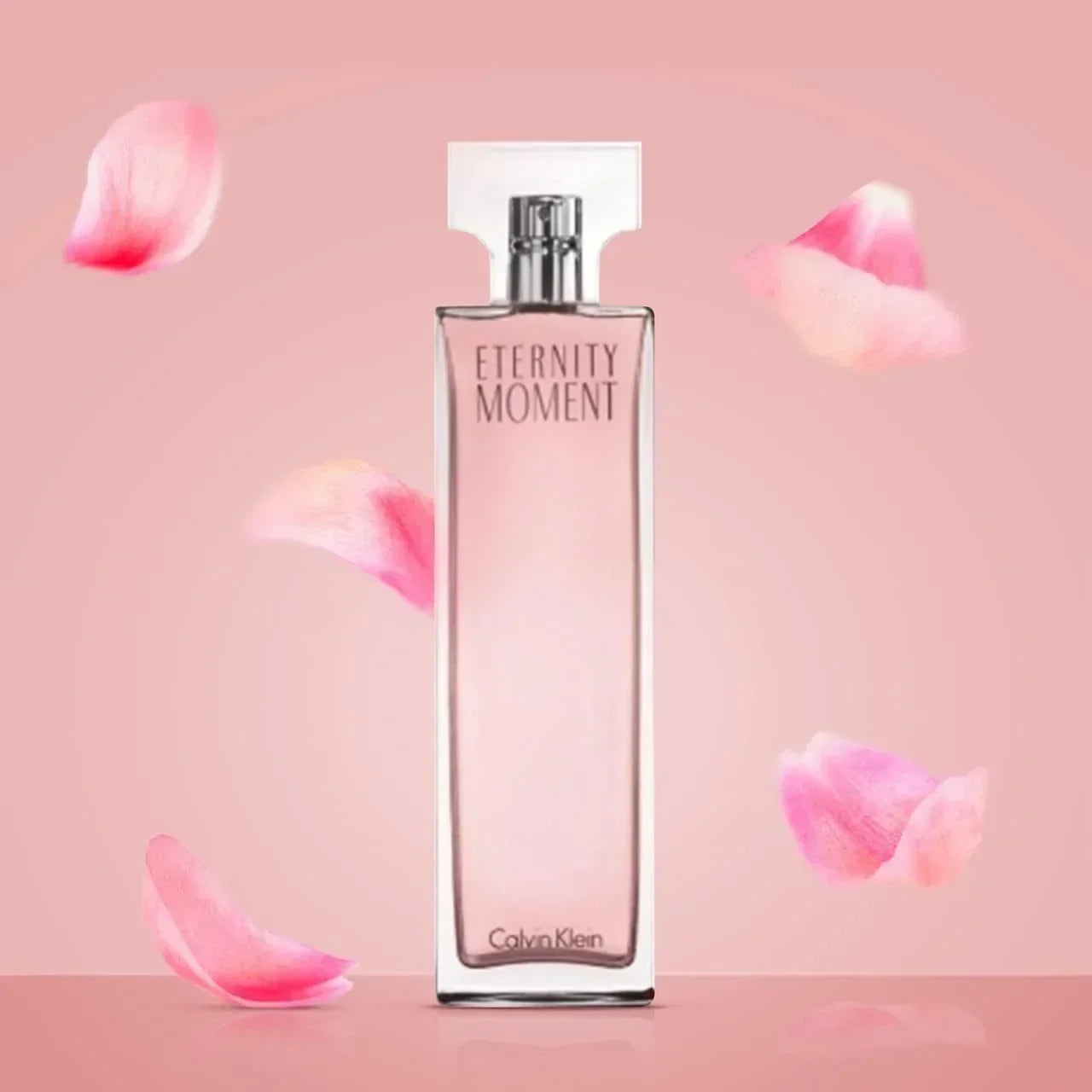 Calvin Klein Eternity Moment Eau de Parfum bottle with pink rose petals 100ml