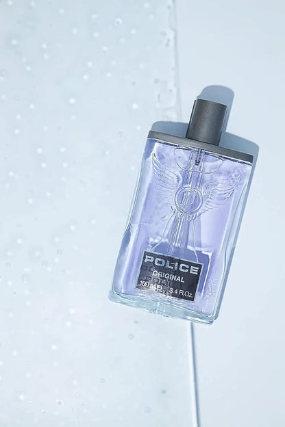 Police Original Eau de Toilette 100ml fragrance bottle with winged emblem on light background