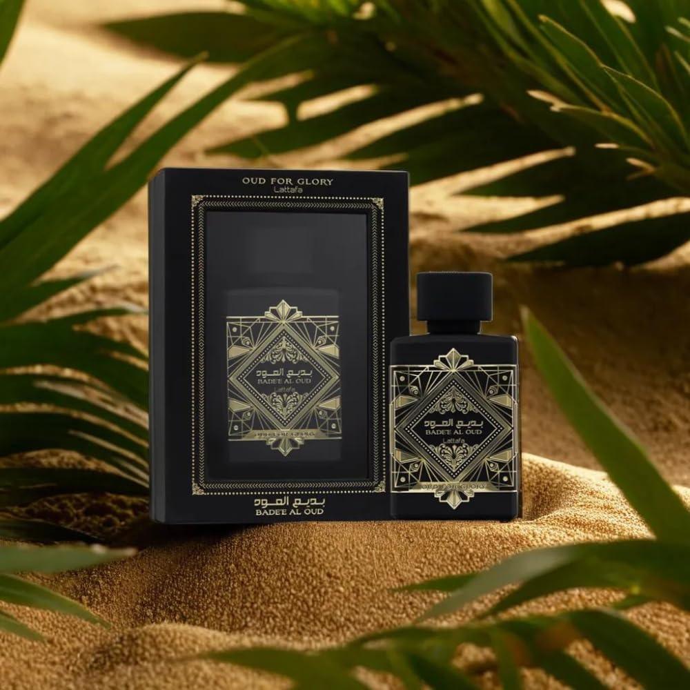 Lattafa Badee Al Oud Oud For Glory EDP 100ml bottle with retail box on sand