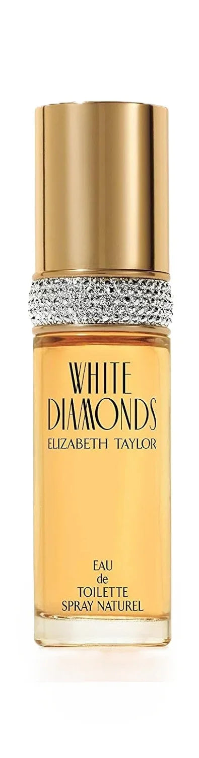 White Diamonds Eau de Toilette Spray Natural by Elizabeth Taylor, featuring a gold cap, a silver rhinestone band, and amber-colored liquid in a clear glass bottle.
