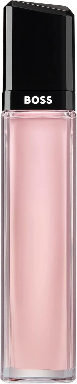 A rectangular glass bottle of HUGO BOSS liquid lipstick with a glossy black cap, showing a soft pink shade inside. The brand name 'BOSS' is printed in white on the black cap.