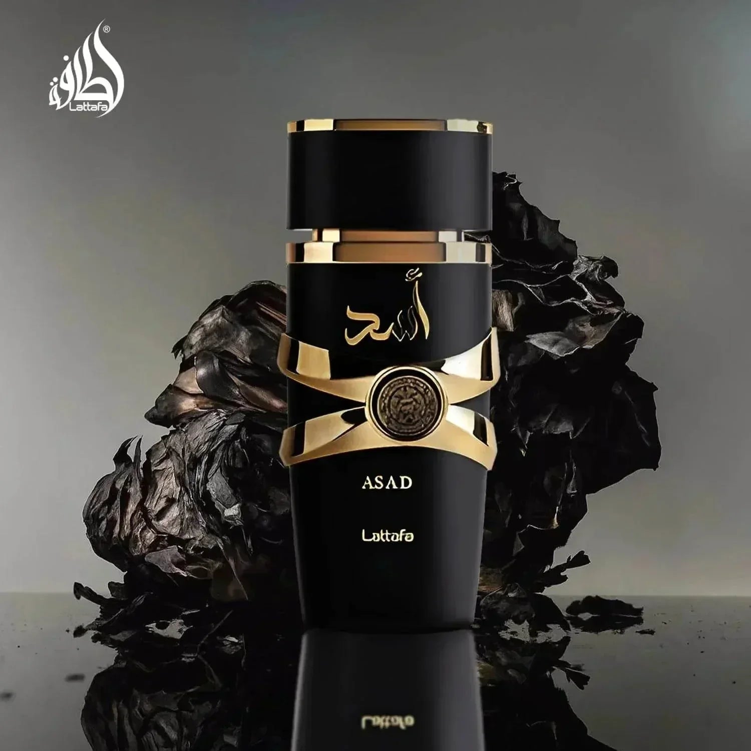 Lattafa Asad fragrance bottle with gold accents and black packaging