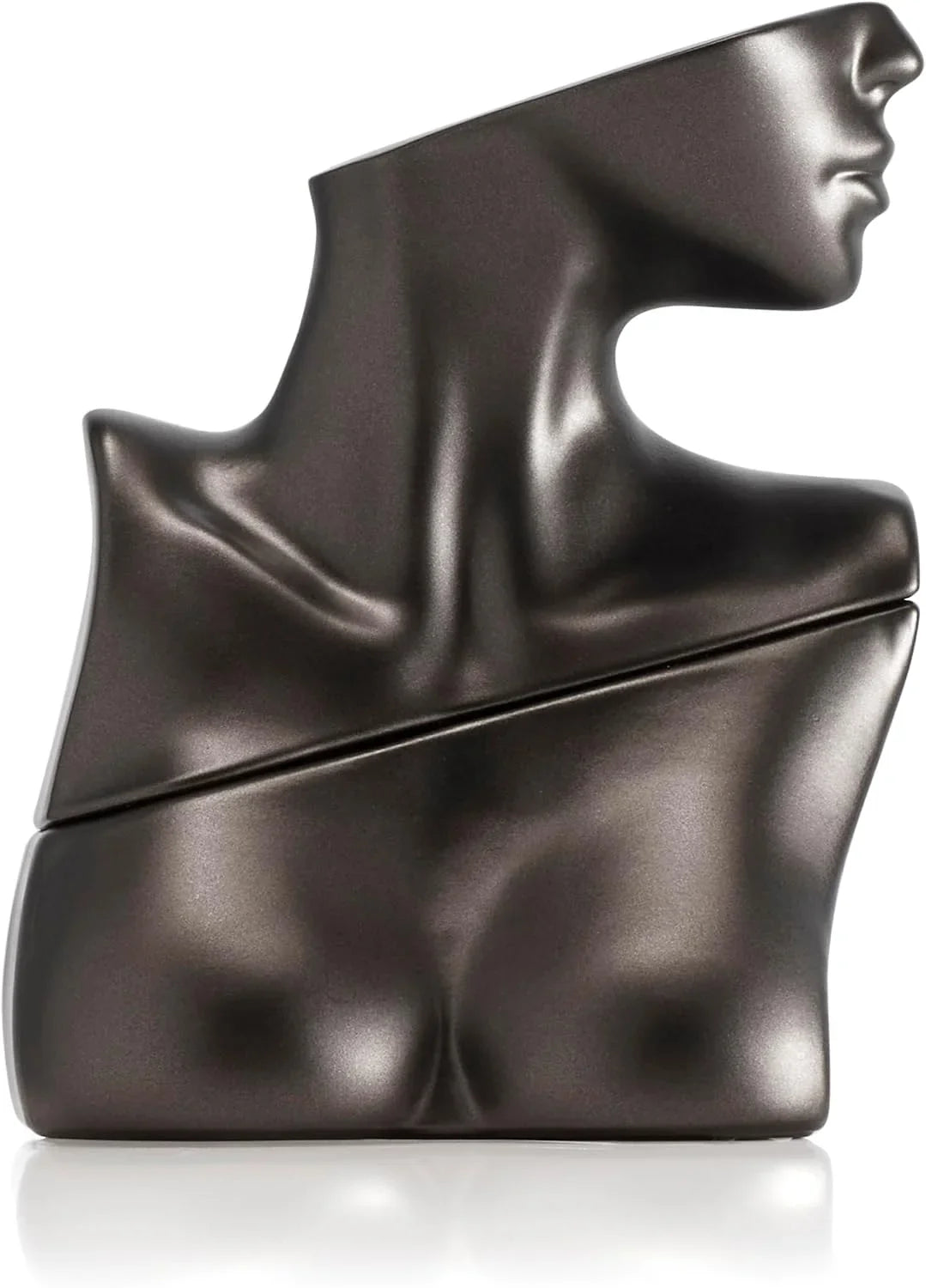 A sculptural dark metallic perfume bottle shaped like a stylized female torso and neck in a side profile, shown on a clean white background with a soft reflection. 100ml
