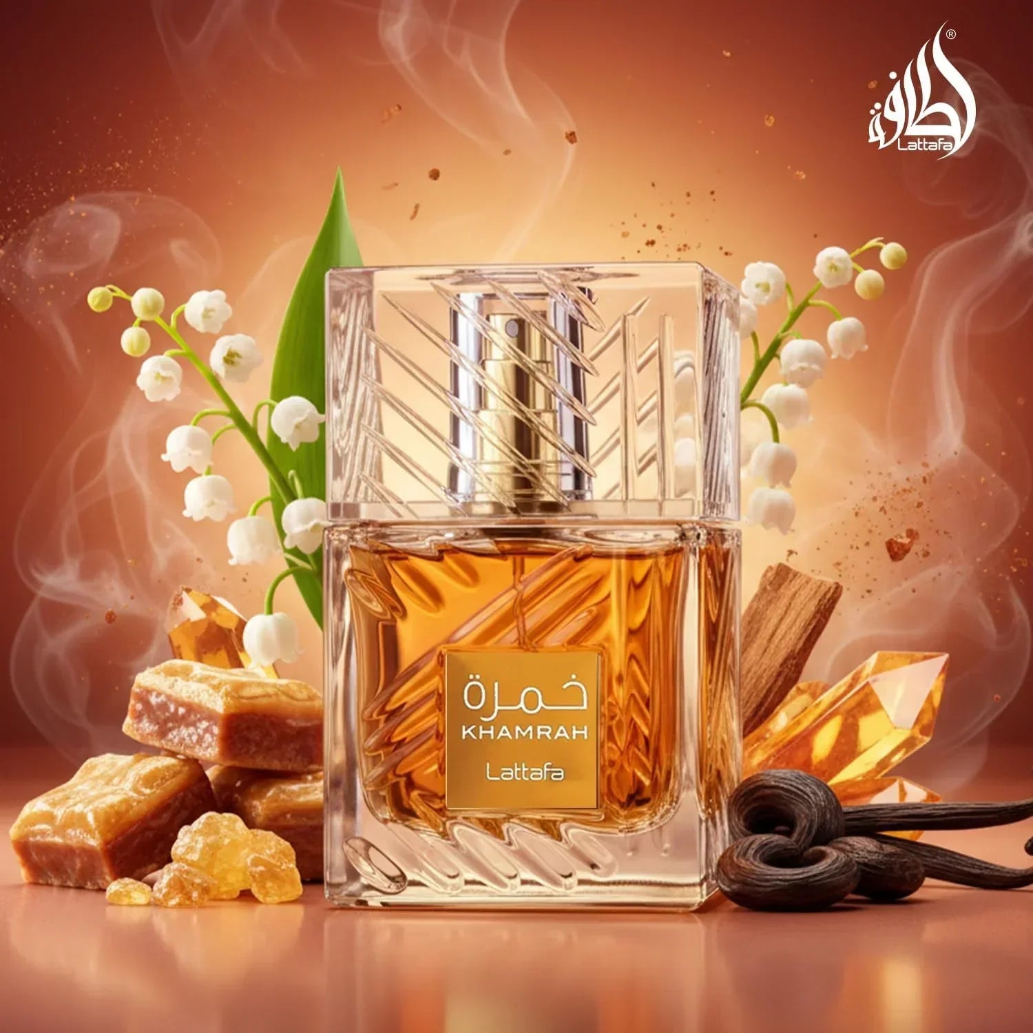 Lattafa Khamrah fragrance bottle with vanilla pods, caramel, and white flowers