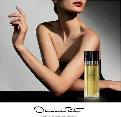 Oscar de la Renta Oscar Eau de Toilette fragrance bottle with model