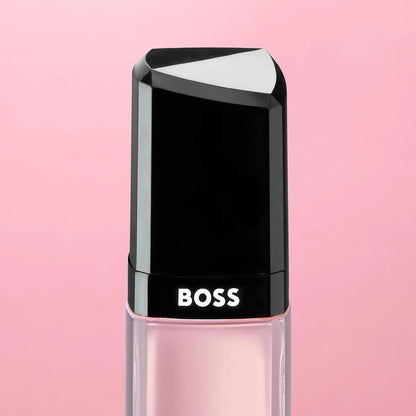 BOSS nail polish bottle on a pink background