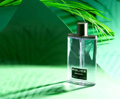 Police Original Eau de Toilette 100 ml fragrance bottle with green leaf backdrop