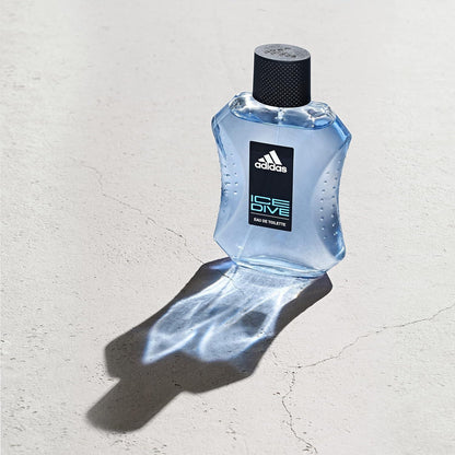 Adidas Ice Dive Eau de Toilette fragrance bottle on textured surface