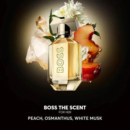 BOSS The Scent For Her Eau de Parfum bottle with peach and white flower accents