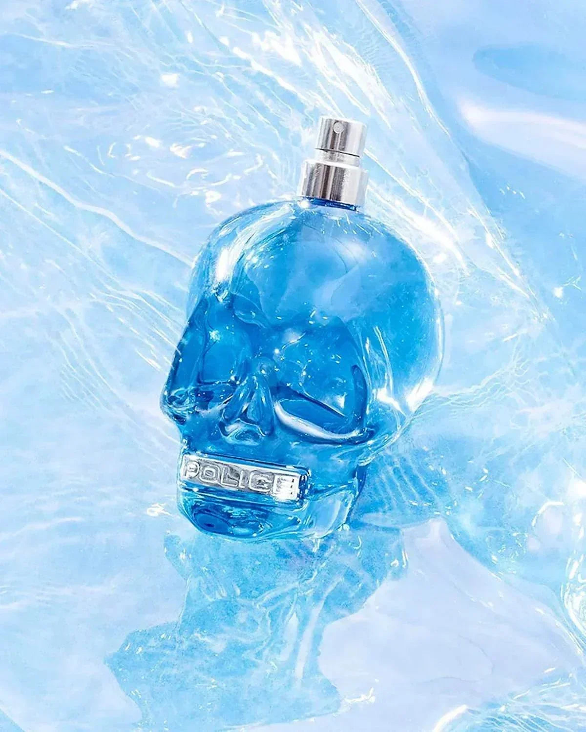 Police Ice Cool fragrance bottle in blue skull design with water effect