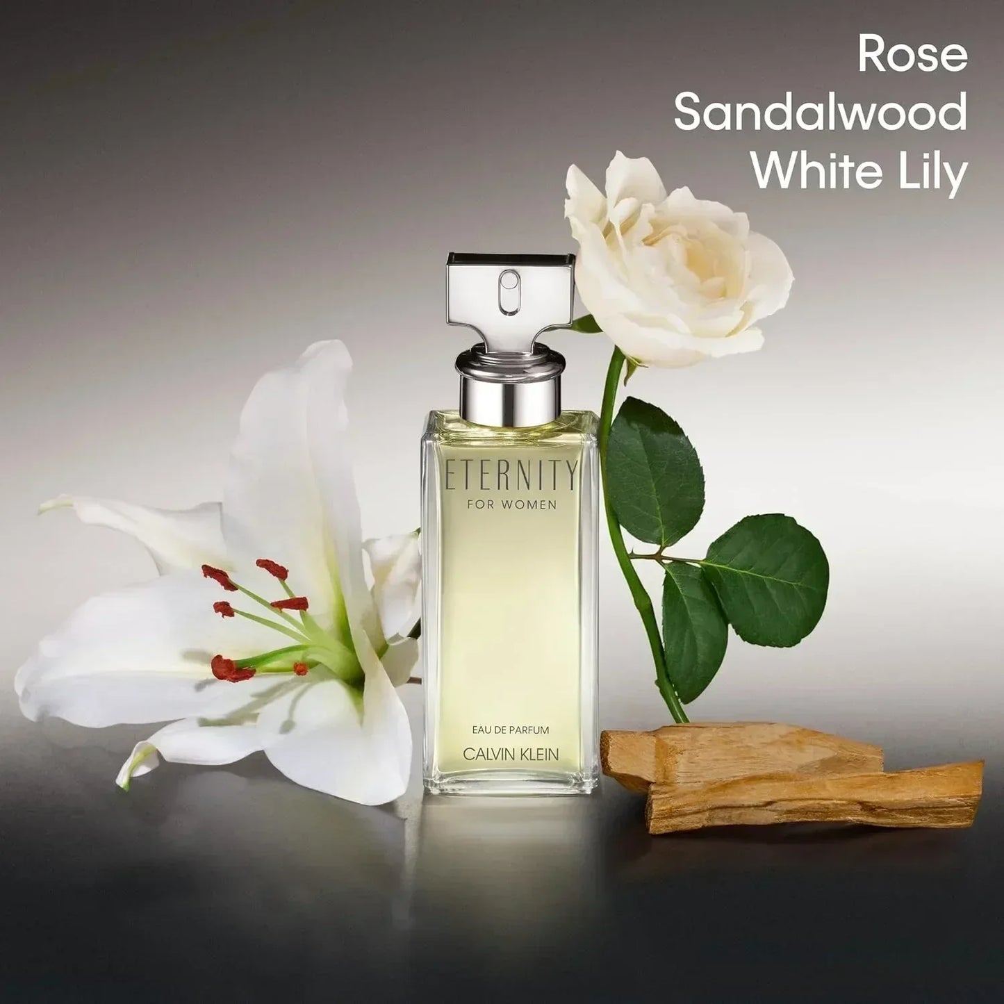 Calvin Klein Eternity for Women Eau de Parfum bottle with white rose and lily