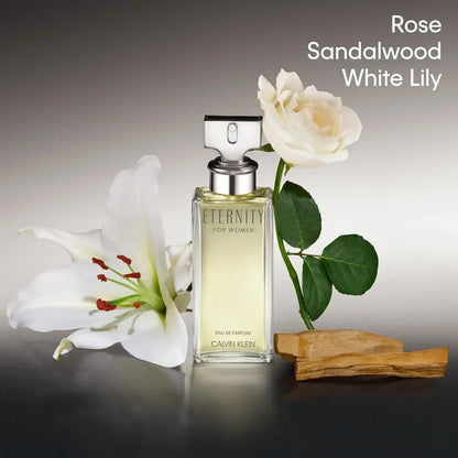 Calvin Klein Eternity for Women Eau de Parfum bottle with white rose and lily