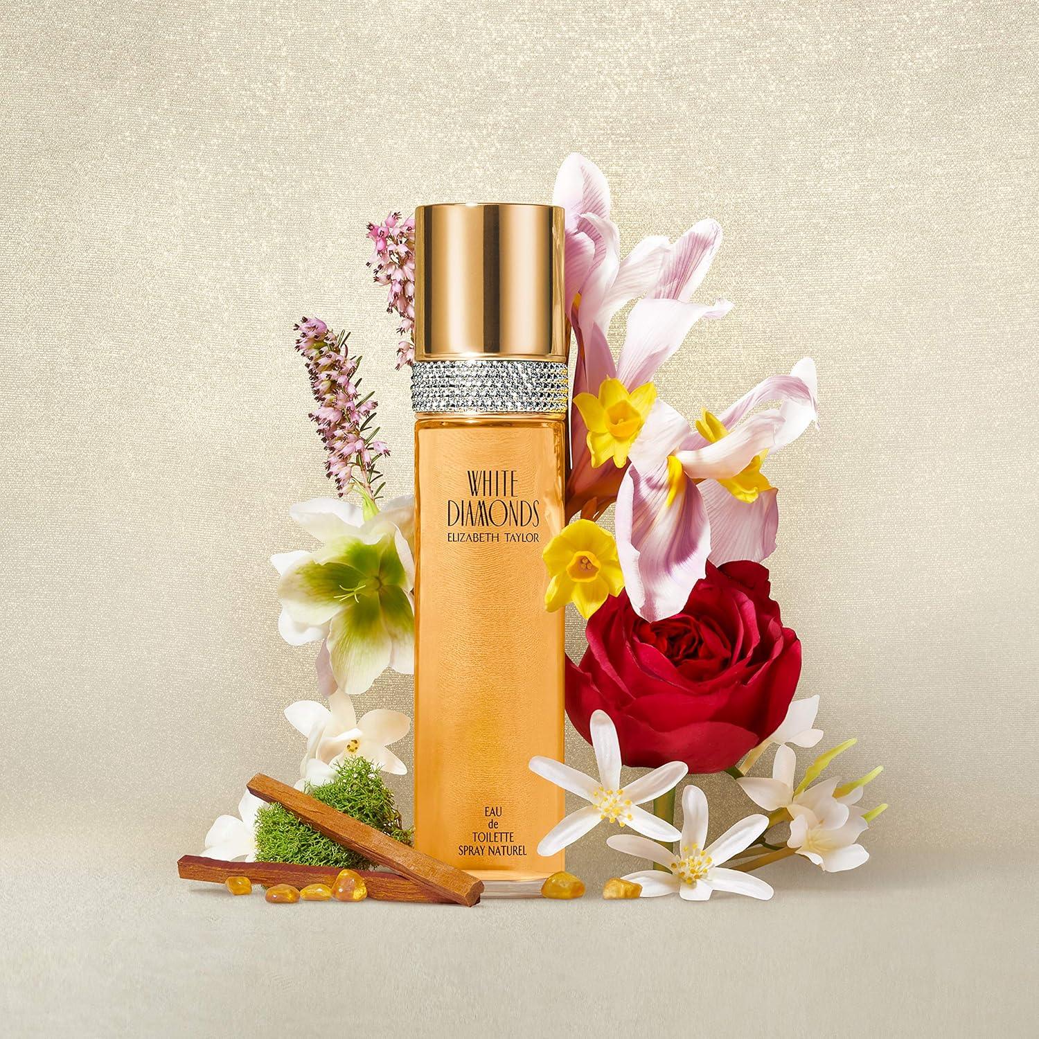 Perfume bottle with decorative flowers on a beige background