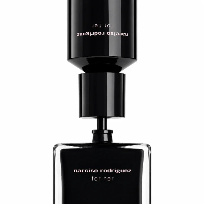 Narciso Rodriguez For Her perfume bottle in a matte black finish, shown with its cap removed and positioned above the bottle against a clean white background.